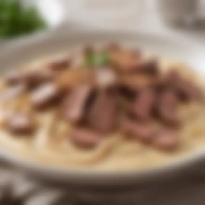 Close-up of tender beef strips in creamy sauce