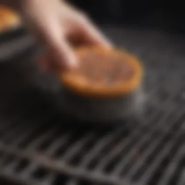 Grill Brush Action Close-up of a grill brush effectively removing residue