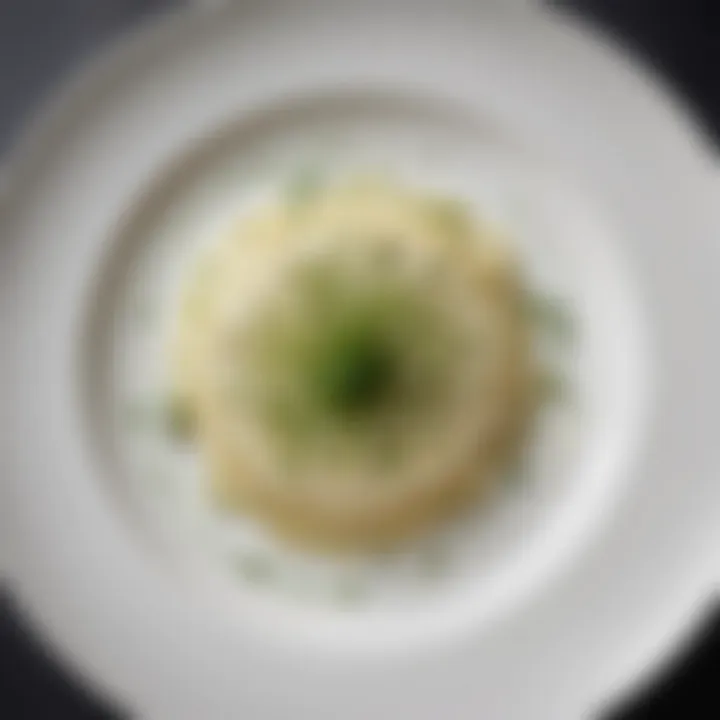 An elegant presentation of leek risotto on a fine dining plate