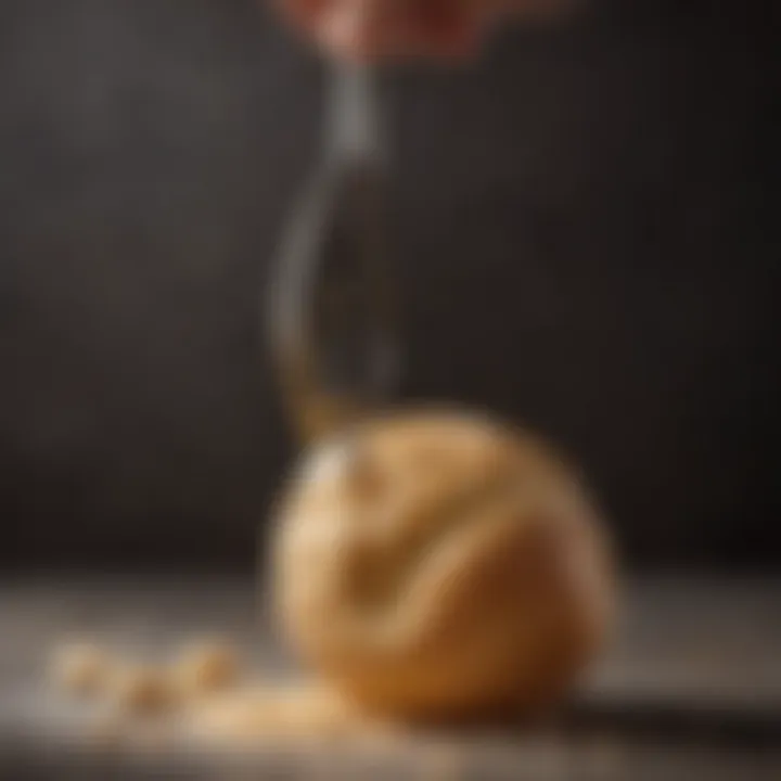 Close-up of a dough hook showcasing its design and texture.