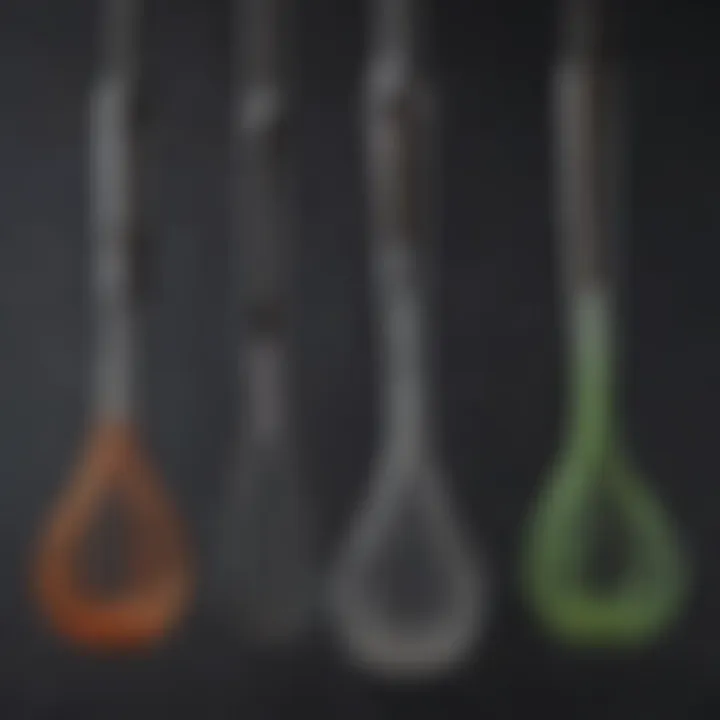 An assortment of whisk attachments with different sizes and shapes.