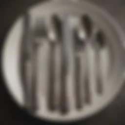 A collection of tarnished silverware before cleaning