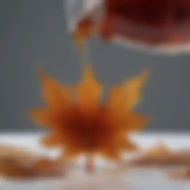 A close-up of maple syrup being poured into a glass