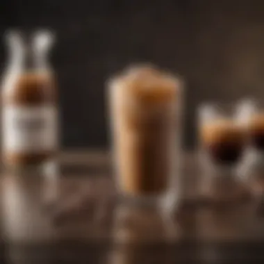 A beautifully styled cold coffee drink next to coffee beans and ice cubes