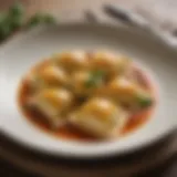 An elegant dish of ravioli with a rich sauce garnished with herbs