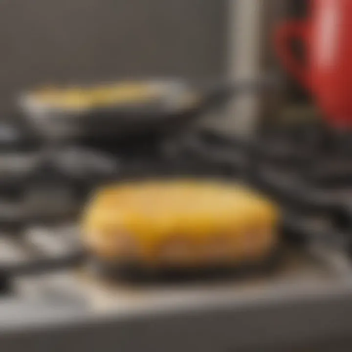 A detailed view of stubborn grease stains on a stove top.