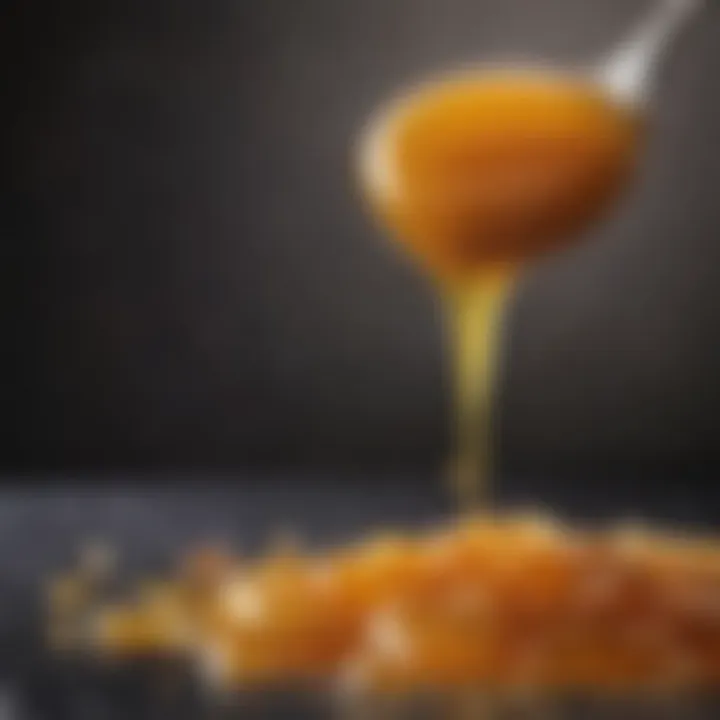 Close-up of honey drizzling from a spoon