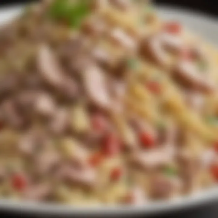 A close-up of the textures and layers in cold tuna salad with pasta