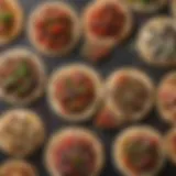 A variety of flatbreads displayed artistically with toppings