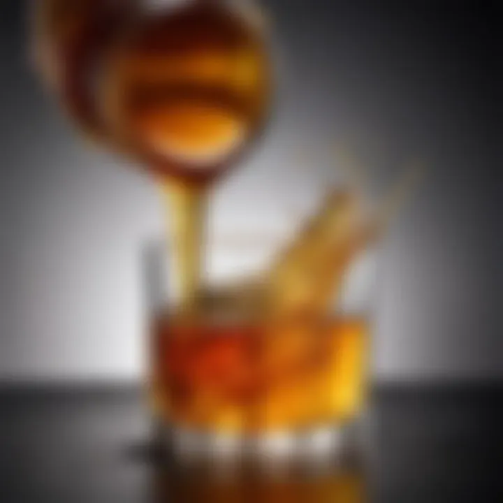 A rich, golden pour of Jack Daniel's Tennessee Honey into a glass.