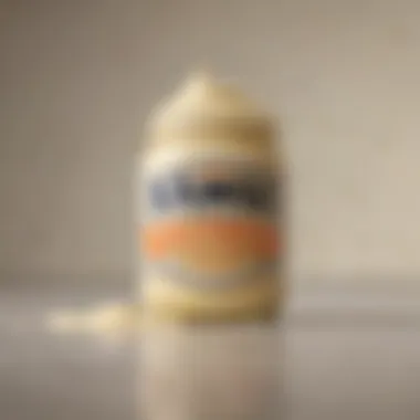 A close-up of a jar of premium pasteurized mayonnaise highlighting its texture.