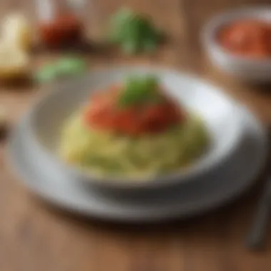 Zucchini Noodles with Marinara A plate of zucchini noodles topped with marinara sauce and basil
