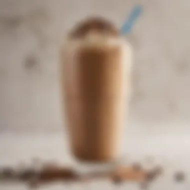 A close-up of a creamy coffee smoothie adorned with cocoa nibs and coconut flakes