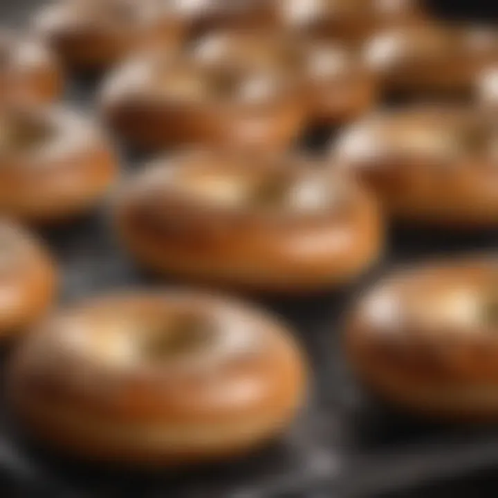 Freshly baked bagels cooling on a rack, highlighting craftsmanship.