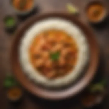 Beautifully Arranged Shrimp Curry Plate A beautifully arranged plate of shrimp curry with rice and garnishes