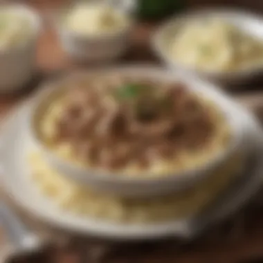 A hearty bowl of Stroganoff served with a side of creamy mashed potatoes