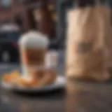 Dunkin coffee cup alongside an Uber Eats delivery bag