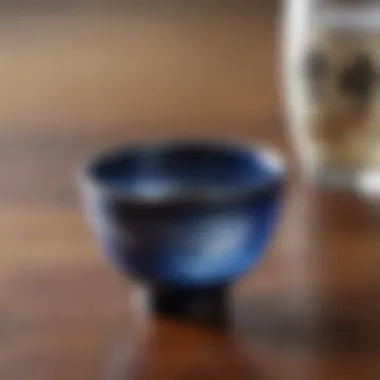Sake in a Traditional Cup A close-up view of a sake cup filled with clear, pristine sake, reflecting light beautifully.