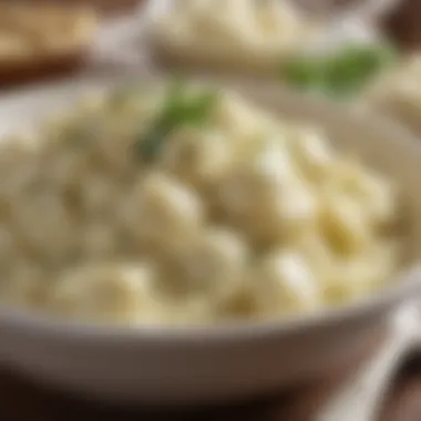 A close-up of creamy garlic mashed potatoes with a sprinkle of herbs.