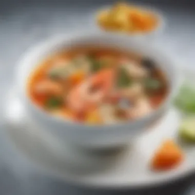 Exquisite Seafood Fusion An elegant presentation of a seafood flat belly soup with colorful garnishes
