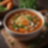A vibrant bowl of vegetable flat belly soup garnished with fresh herbs