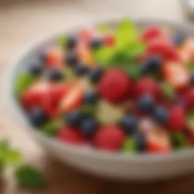 Vibrant Mixed Berry Fruit Salad Colorful fruit salad with berries and mint garnish