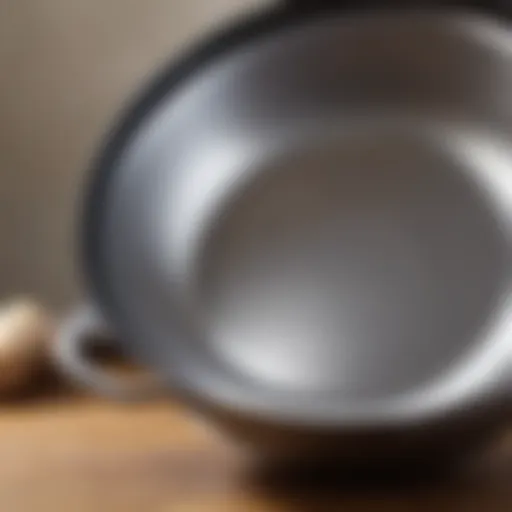 A close-up of a premium stainless steel frying pan reflecting light