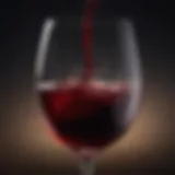 Close-up of a glass of red wine showcasing its rich color and clarity