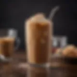 A glass of iced coffee with condensation