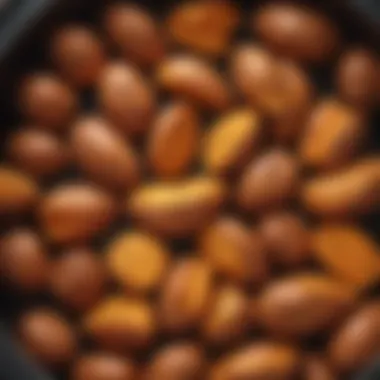 Seasoned sweet potatoes in an air fryer basket