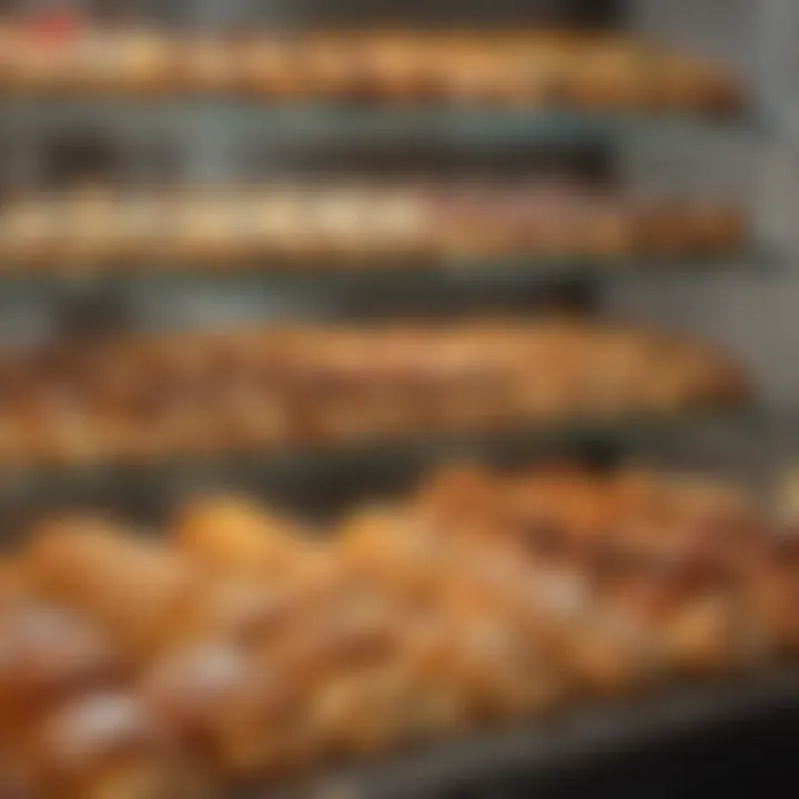 An array of pastries and cakes displayed elegantly within the bakery