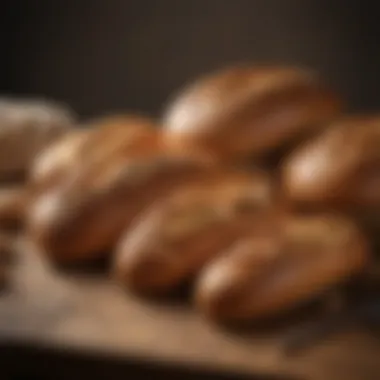 The Art of Bread: A Collection of Artisan Loaves Freshly baked loaves resting on a wooden surface, highlighting various types of bread.