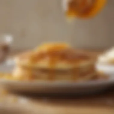 Fluffy Pancake with Honey Drizzle A close-up view of a fluffy pancake being drizzled with honey