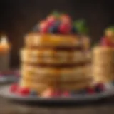 A well-stacked tower of golden pancakes topped with fresh berries and syrup