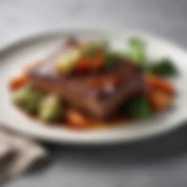 A beautifully plated dish of short pork ribs with garnished vegetables