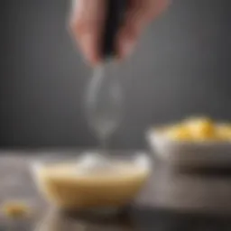 Close-up of the Pampered Chef Mini Whisk showcasing its ergonomic handle