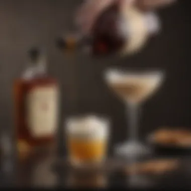 Crafting the Perfect Whiskey Cream Cocktail An elegant cocktail shaker next to a glass filled with a creamy whiskey cocktail